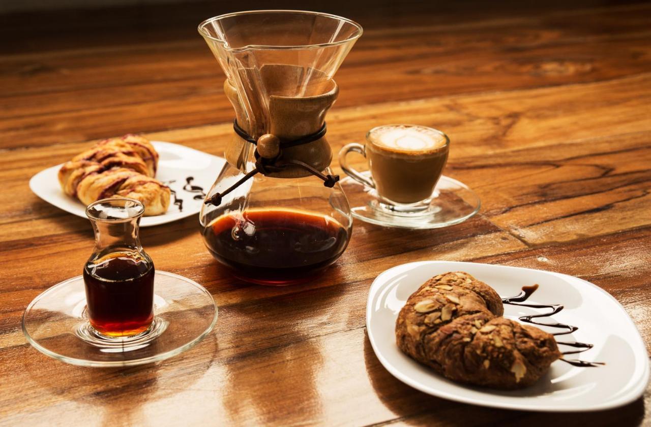 The Coffee Club Apartahotel 马尼萨莱斯 外观 照片