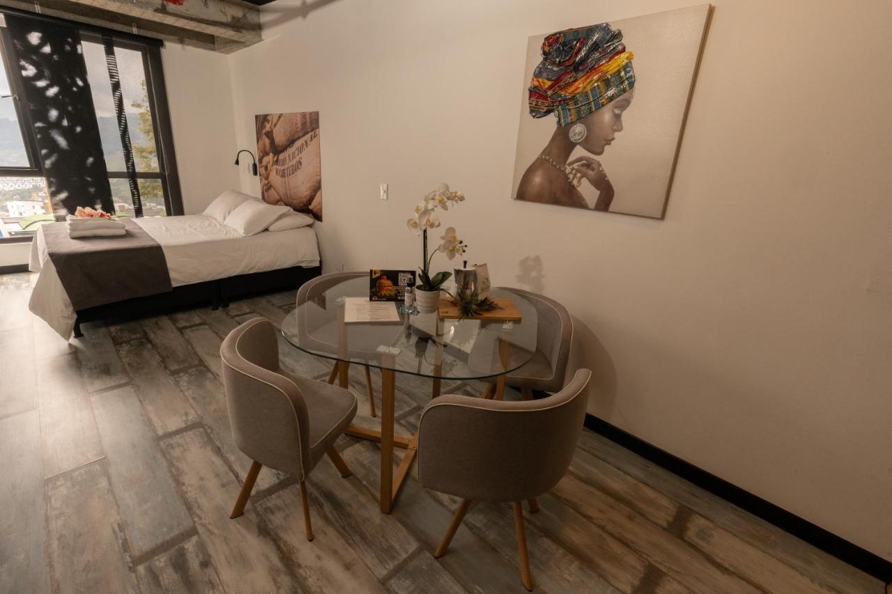 The Coffee Club Apartahotel 马尼萨莱斯 外观 照片