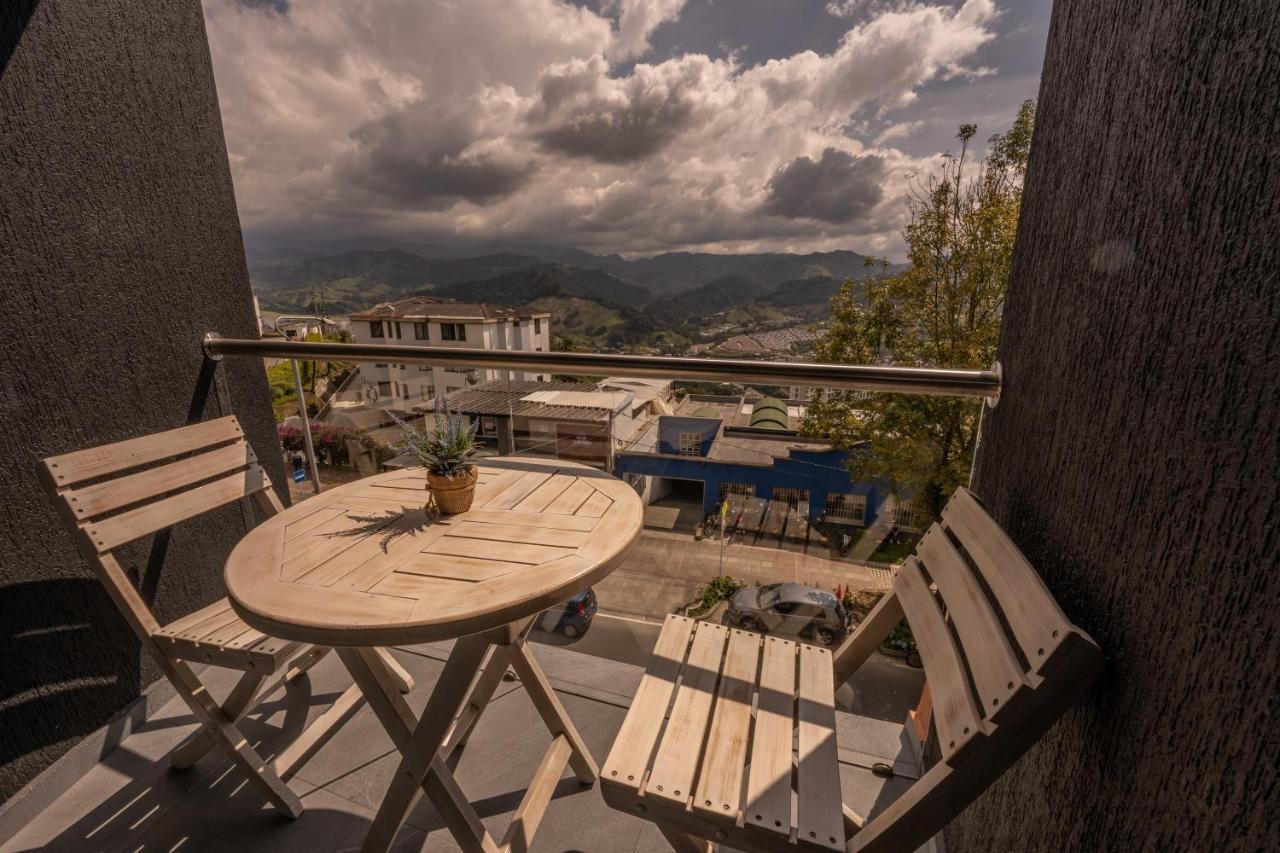 The Coffee Club Apartahotel 马尼萨莱斯 外观 照片
